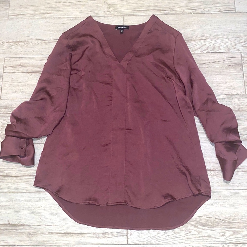 Maroon Polyester Express blouse.